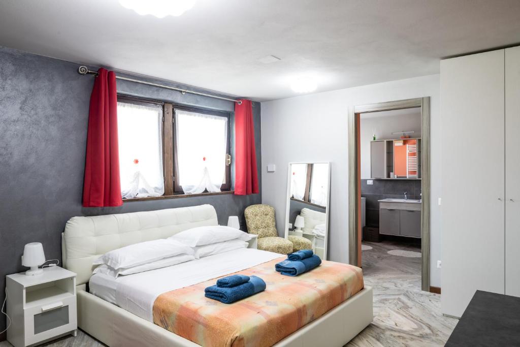 Postel nebo postele na pokoji v ubytování Villa De Alberti