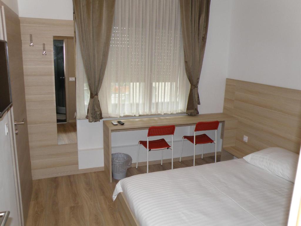 Postel nebo postele na pokoji v ubytování Sweet Dreams Rooms and Apartments Postojna