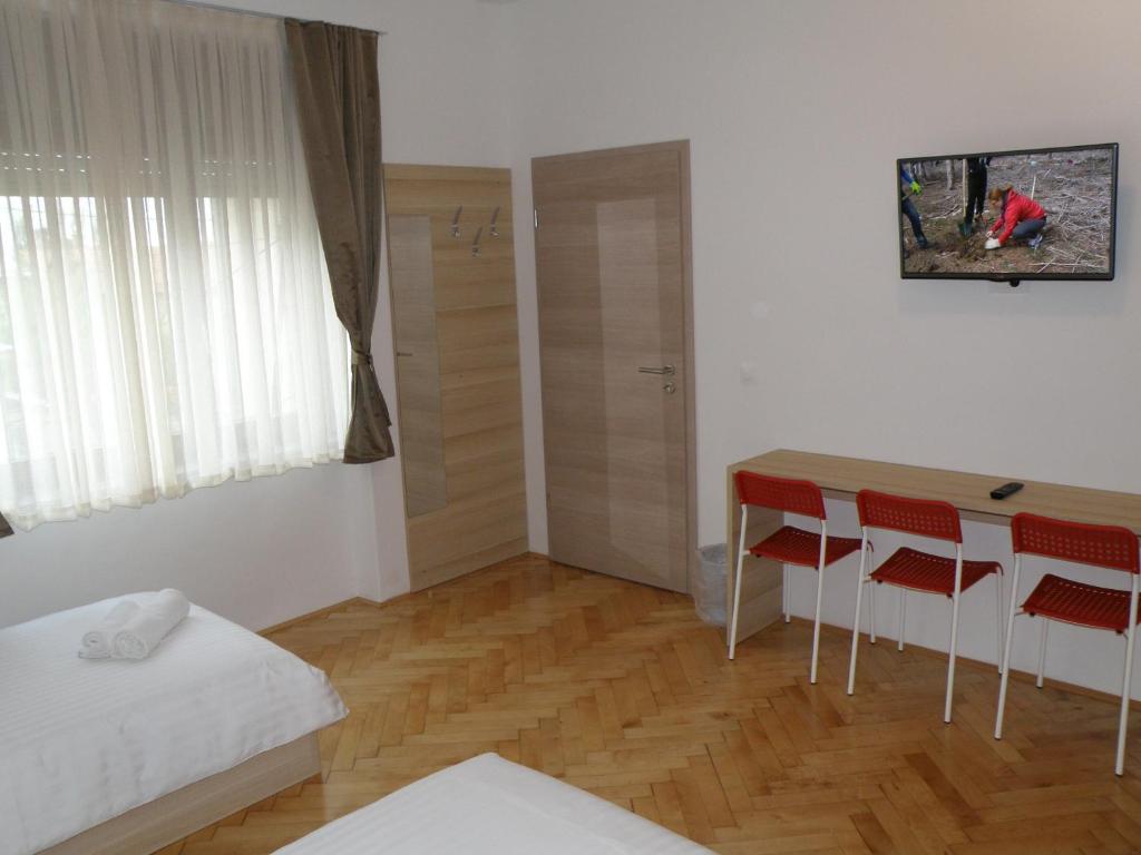 Postel nebo postele na pokoji v ubytování Sweet Dreams Rooms and Apartments Postojna