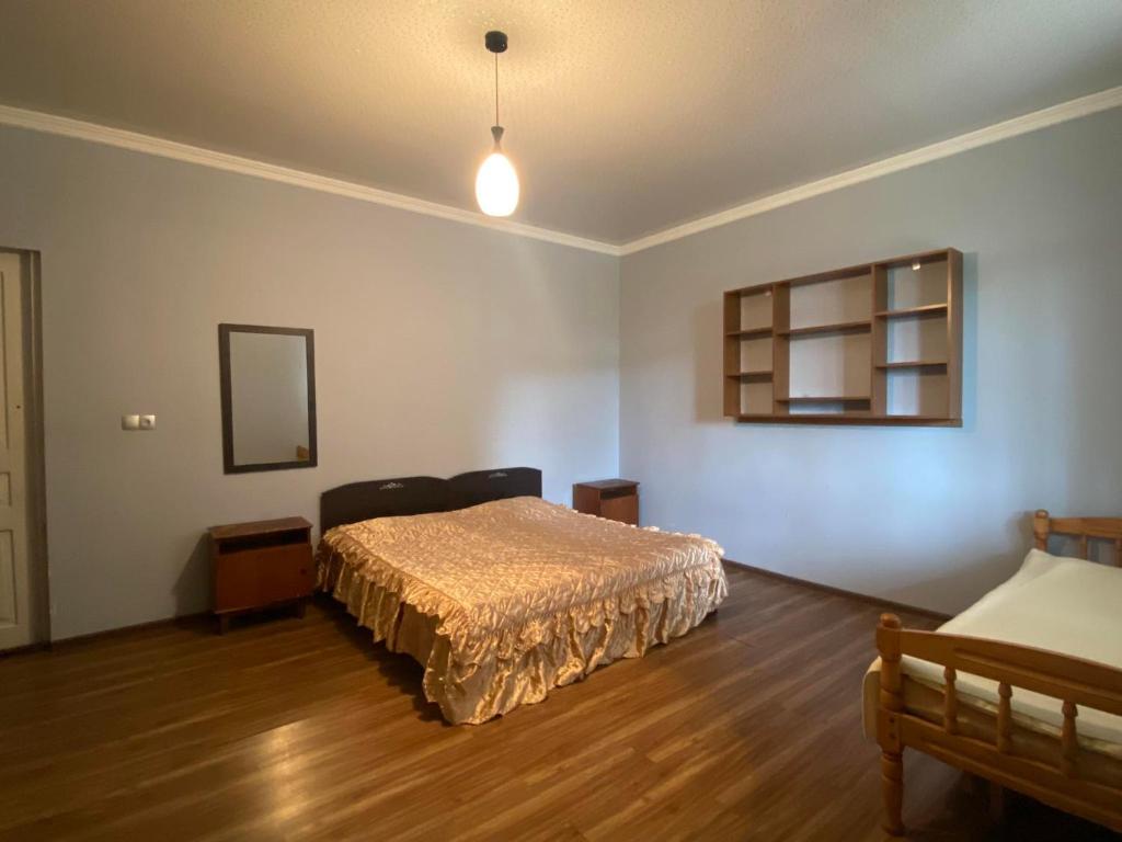 Postel nebo postele na pokoji v ubytování Natia Guest House