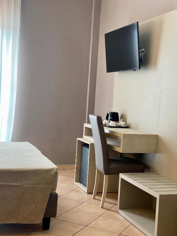 TV a/nebo společenská místnost v ubytování Hotel Miramonti