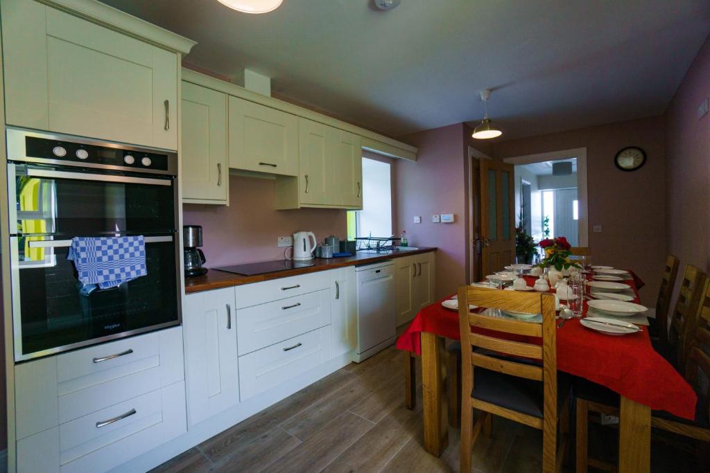 Kuchyň nebo kuchyňský kout v ubytování Carrig Island Lodge