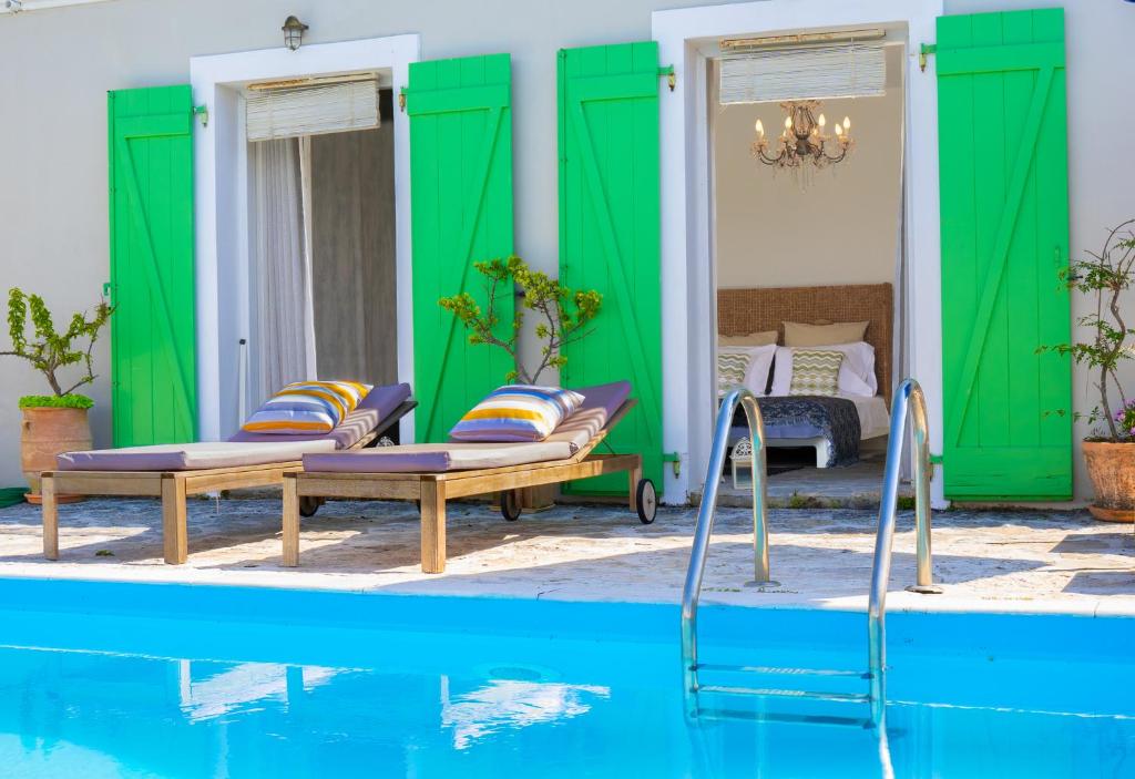 The swimming pool at or close to Circe Villa - Ionian Sea View