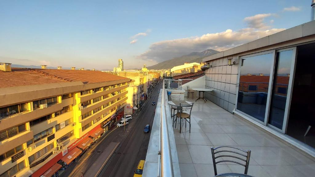a balcony of a building with a view of a street at Adalı Hotel & Suites in Bursa