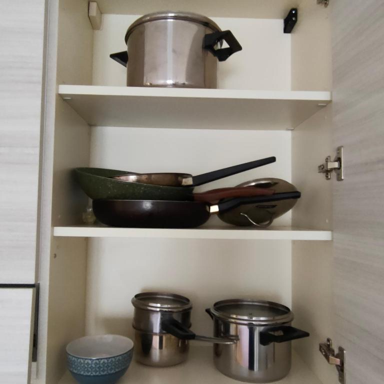 A kitchen or kitchenette at Anto AIRCON studio monolocale a 15 min dal centro
