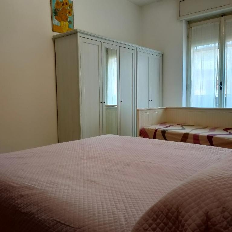 A bed or beds in a room at Anto AIRCON studio monolocale a 15 min dal centro