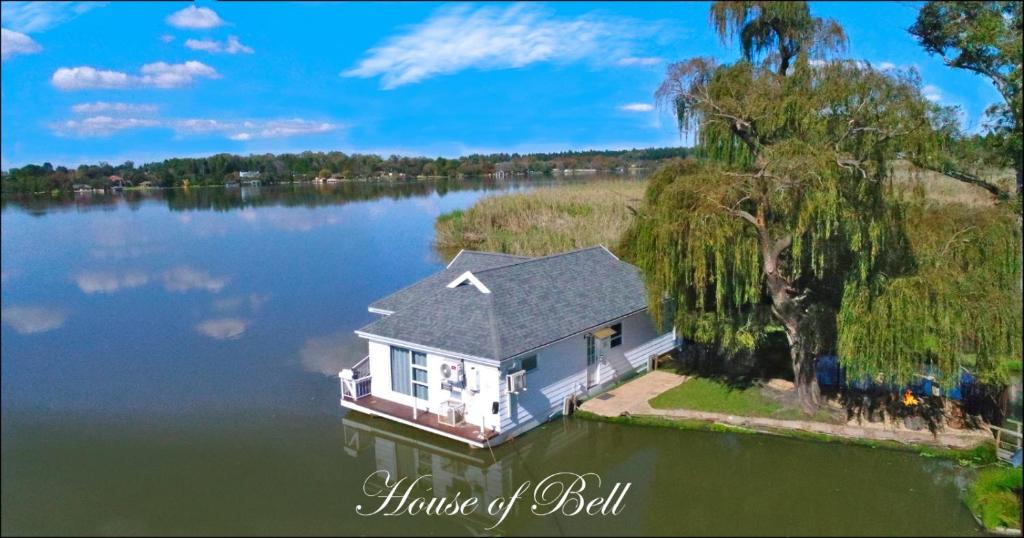 a house in the middle of a lake at House of Bell - Vaal River in Vanderbijlpark
