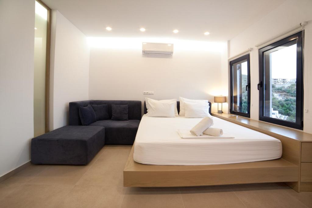 Кровать или кровати в номере Blue Dawn Kalymnos