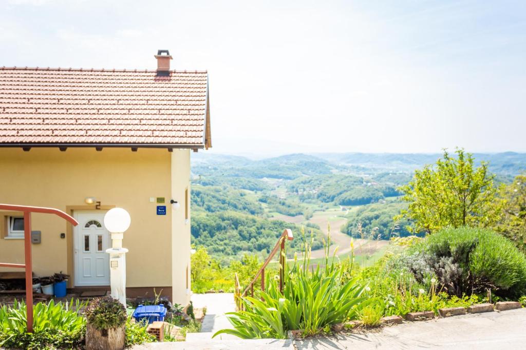 a house with a view of a valley at Apartmani Cerovečki in Krapina