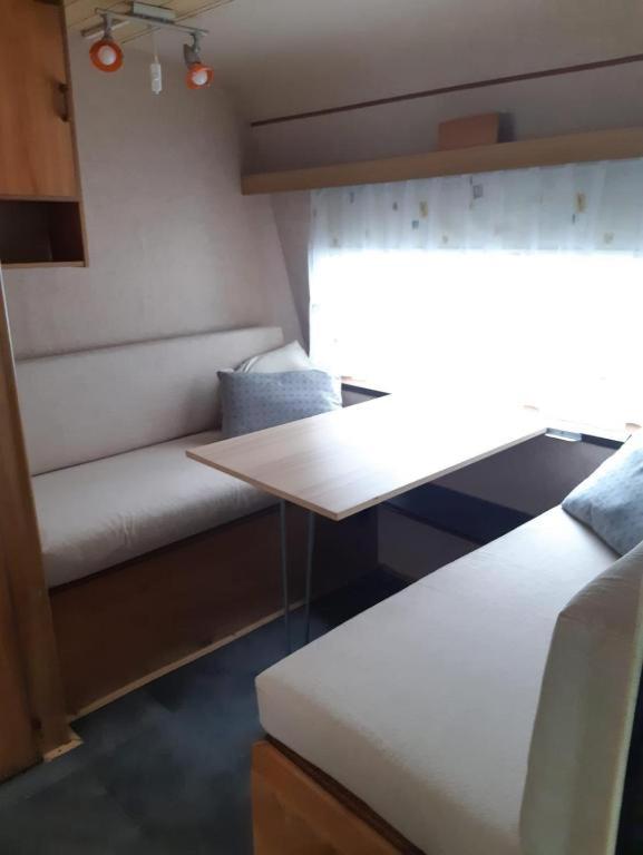 Postel nebo postele na pokoji v ubytování Your Camp Kormoran