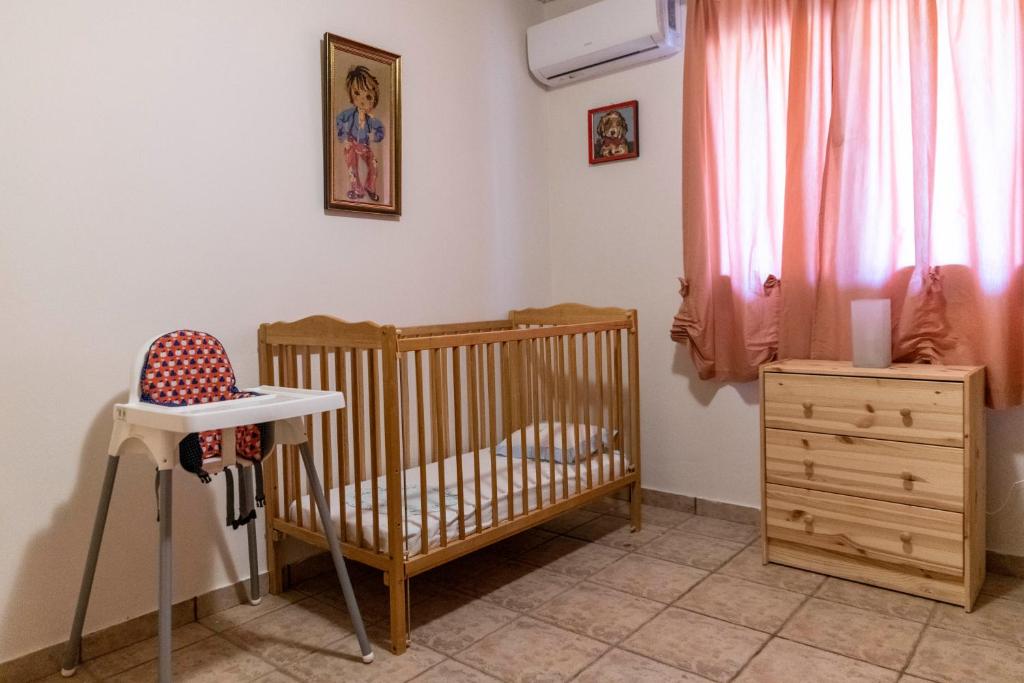 Postel nebo postele na pokoji v ubytování Villa Sofita