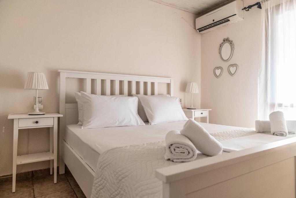Postel nebo postele na pokoji v ubytování Villa Sofita