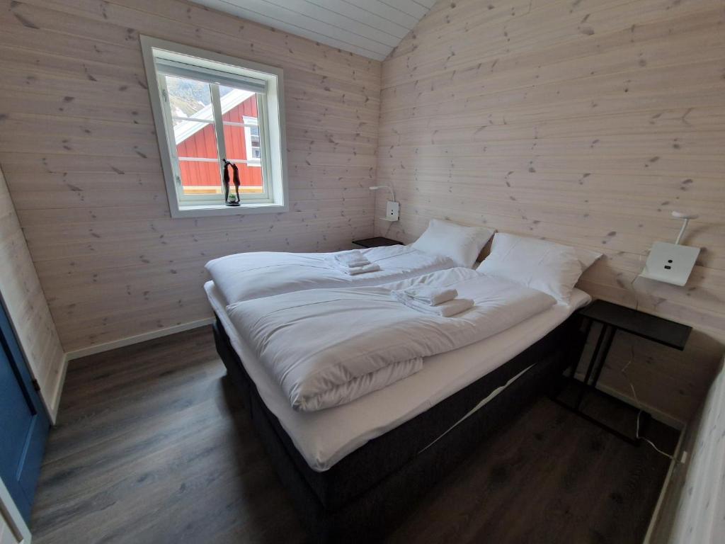 Postel nebo postele na pokoji v ubytování Andøy Vest Rorbuer Reine