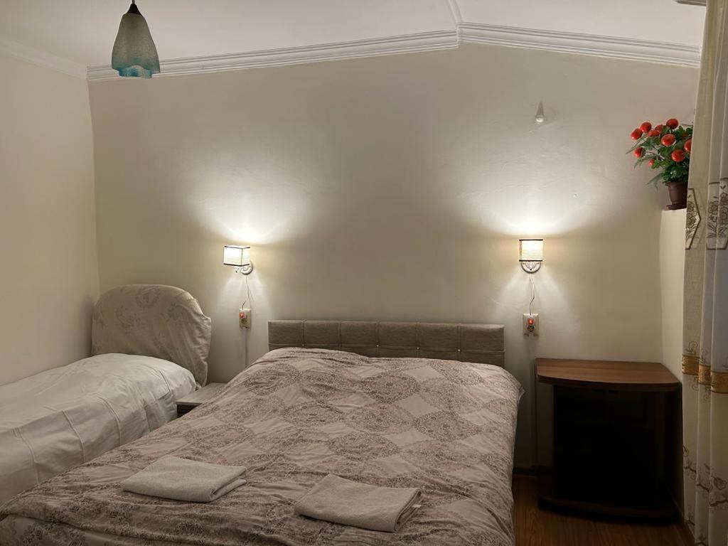 Postel nebo postele na pokoji v ubytování Homestay Seaside by Manuchar