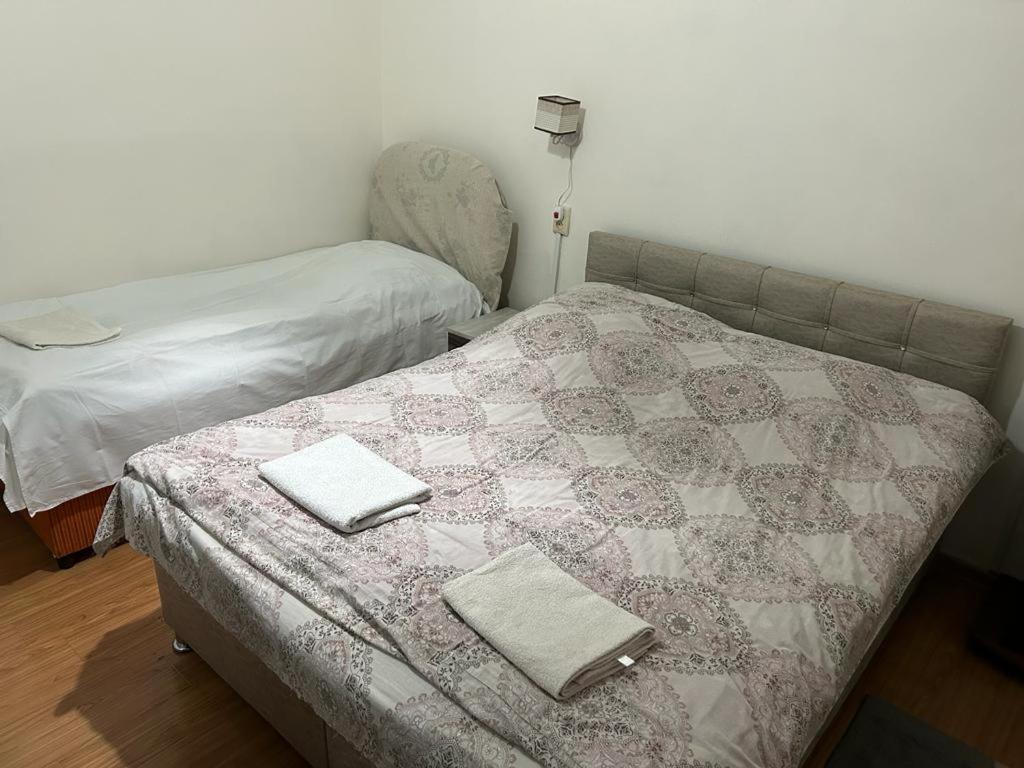 Postel nebo postele na pokoji v ubytování Homestay Seaside by Manuchar