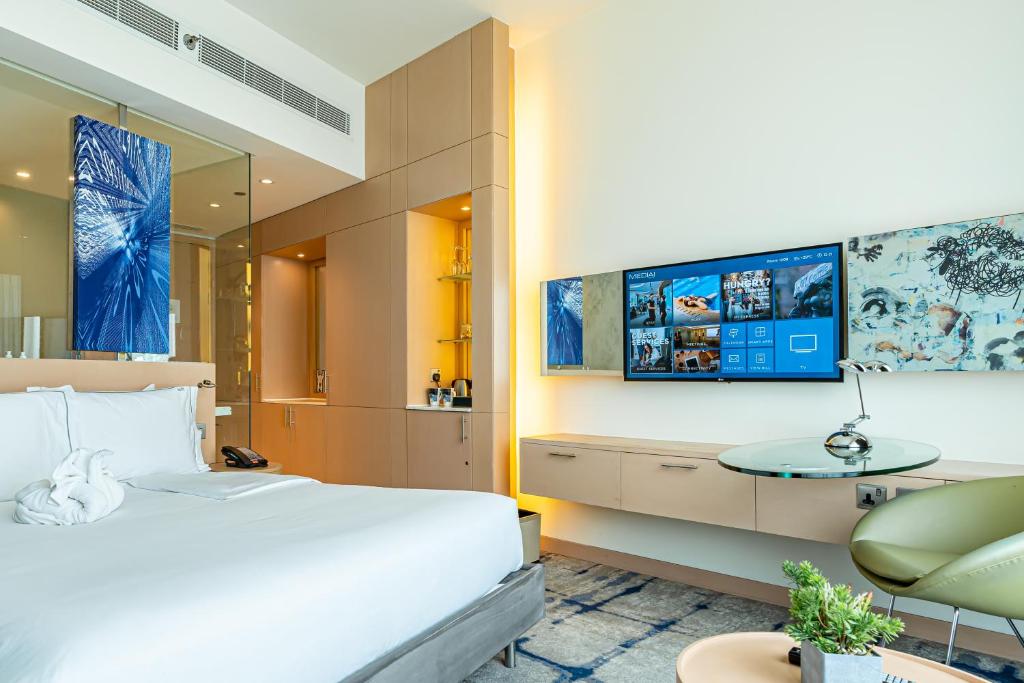TV a/nebo společenská místnost v ubytování Media One Hotel