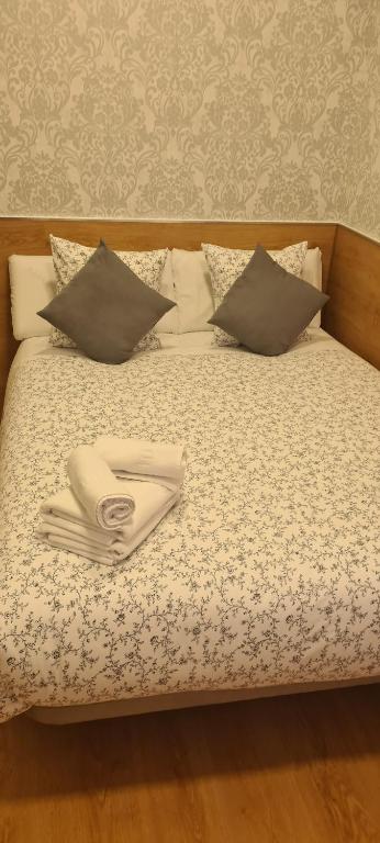 Postel nebo postele na pokoji v ubytování Hostal Salomé