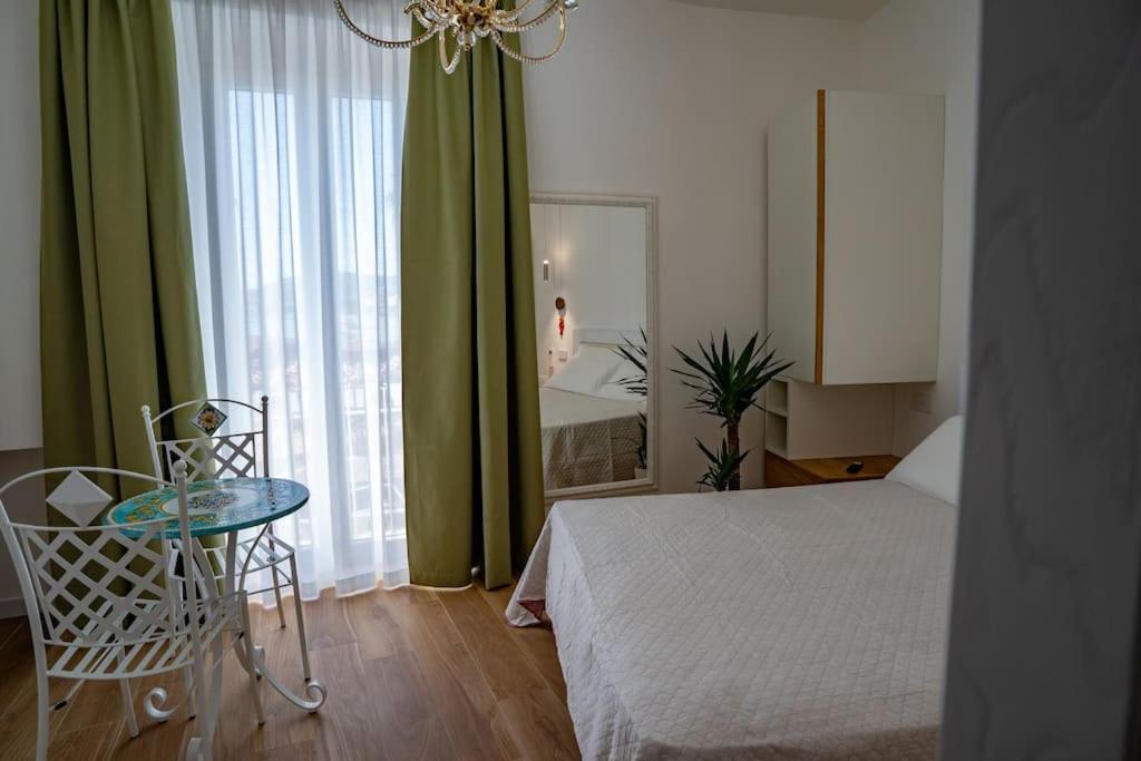 Postel nebo postele na pokoji v ubytování AquaMar Bed and Breakfast