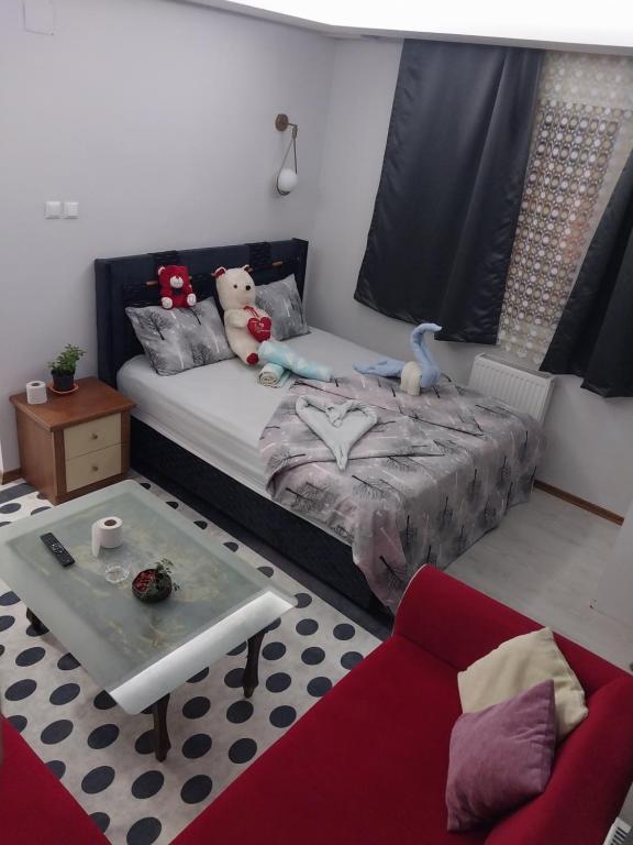 Ένα ή περισσότερα κρεβάτια σε δωμάτιο στο Artemis Apart&Otel