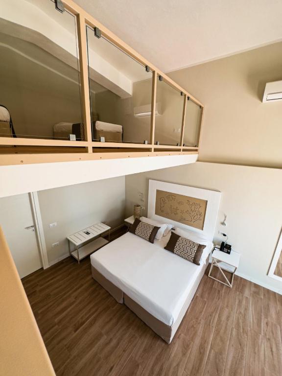 Postel nebo postele na pokoji v ubytování Hotel Lido Beach PHG
