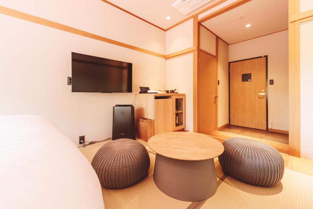 TV a/nebo společenská místnost v ubytování 蓼科BASE kitchen,spa&hotel