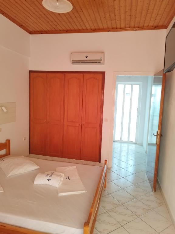 Postel nebo postele na pokoji v ubytování VILLA AGIA AIKATERINI