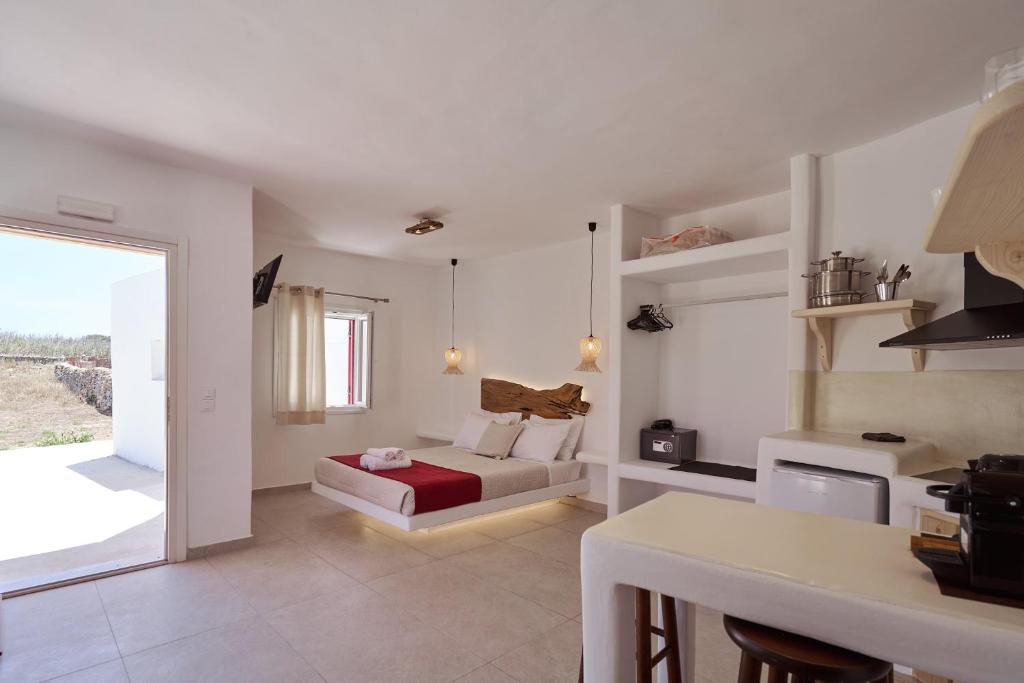 Postel nebo postele na pokoji v ubytování Casa Philippi Suites