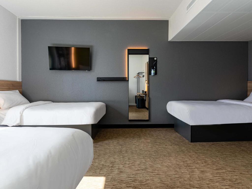 Postel nebo postele na pokoji v ubytování B&B HOTEL Sélestat Centre-Alsace
