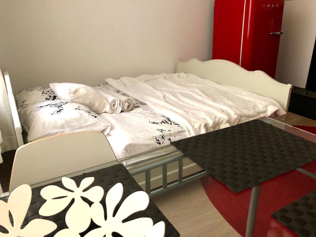Postel nebo postele na pokoji v ubytování Sweet home 40 City Center Punavuori