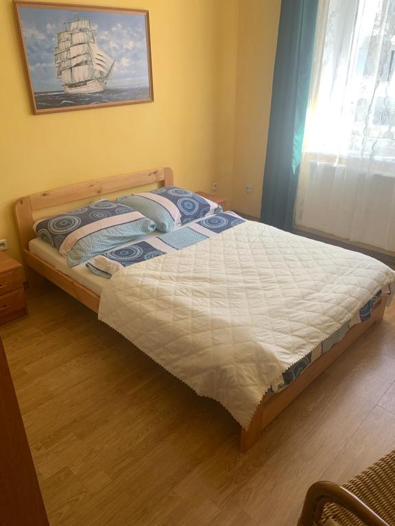 Postel nebo postele na pokoji v ubytování GWIAZDA MORZA