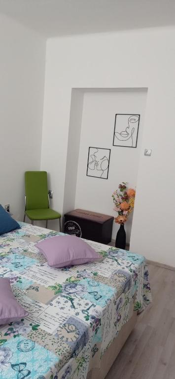 Postel nebo postele na pokoji v ubytování Apartman Elza