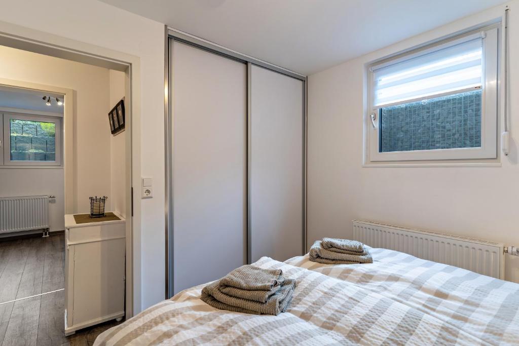 Postel nebo postele na pokoji v ubytování Ferienwohnung Eulennest