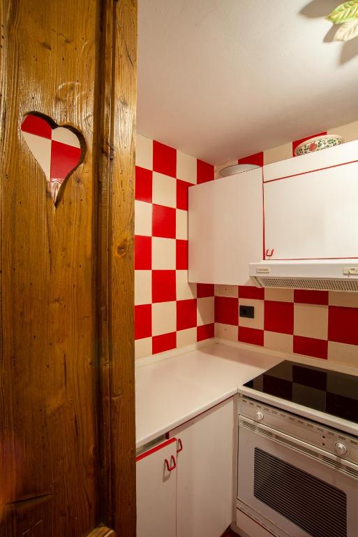 A cozinha ou kitchenette de Maison 21 Cervinia cir n 0468