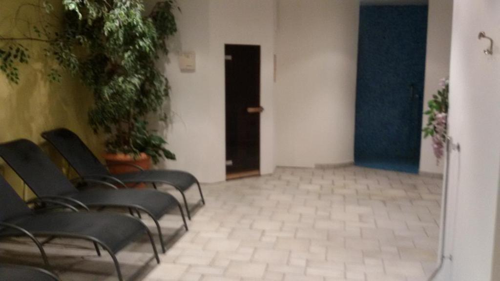 Posezení v ubytování Hotel Maximilian