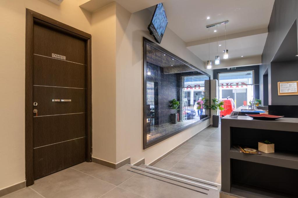 TV a/nebo společenská místnost v ubytování New Amaryllis Hotel