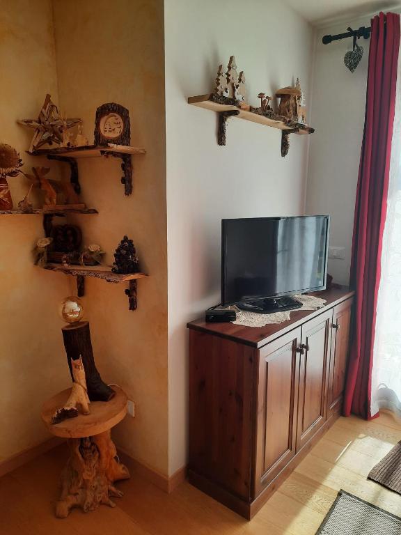 TV a/nebo společenská místnost v ubytování La Casetta di Mariangela