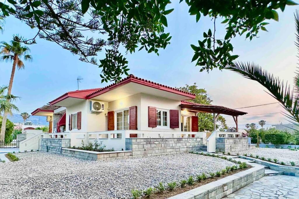 a house with a red roof at Hippocrates house in Kos