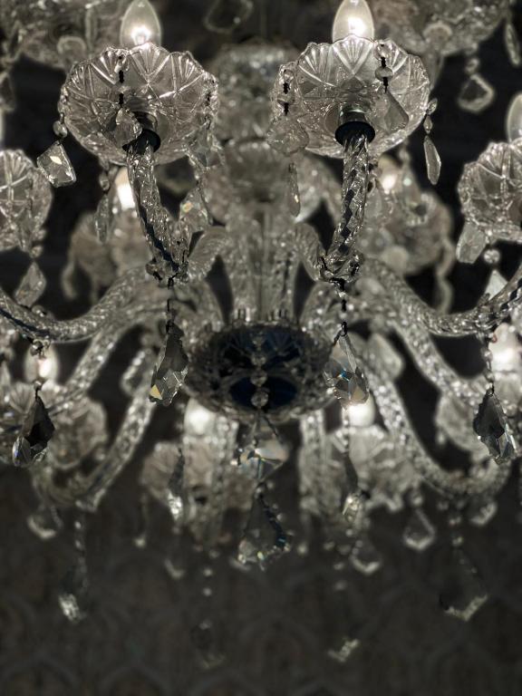 a close up of a chandelier with crystals at Riad Del Rey in Rabat