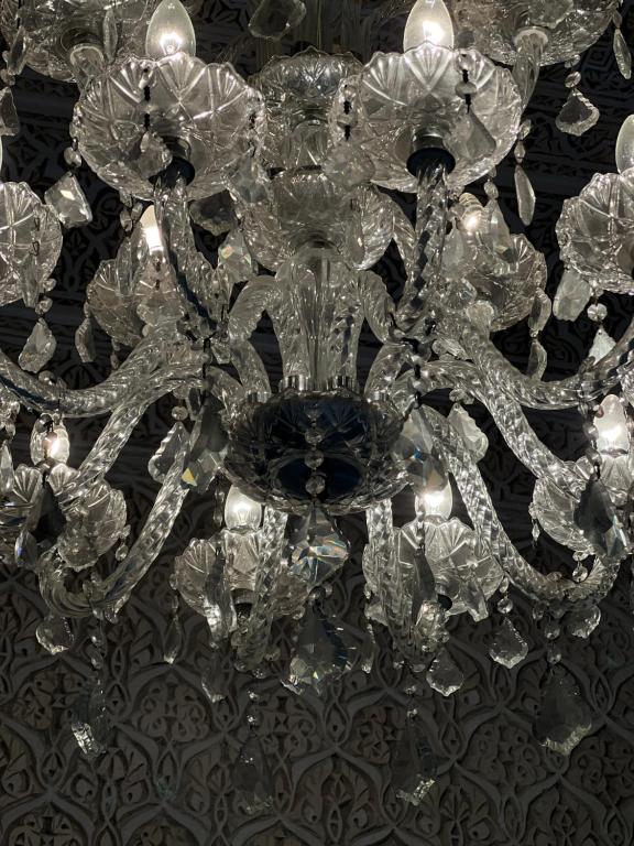 a chandelier is hanging from a ceiling at Riad Del Rey in Rabat