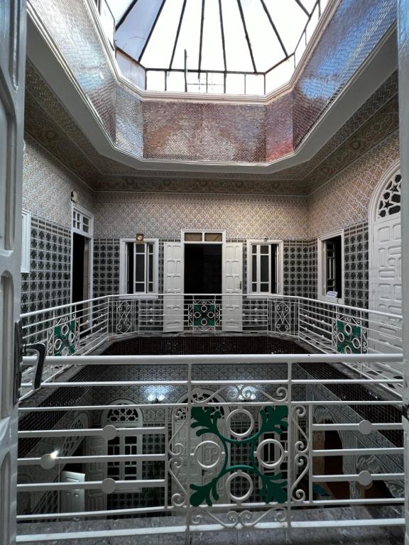 a room with a skylight and a glass ceiling at Riad Del Rey in Rabat