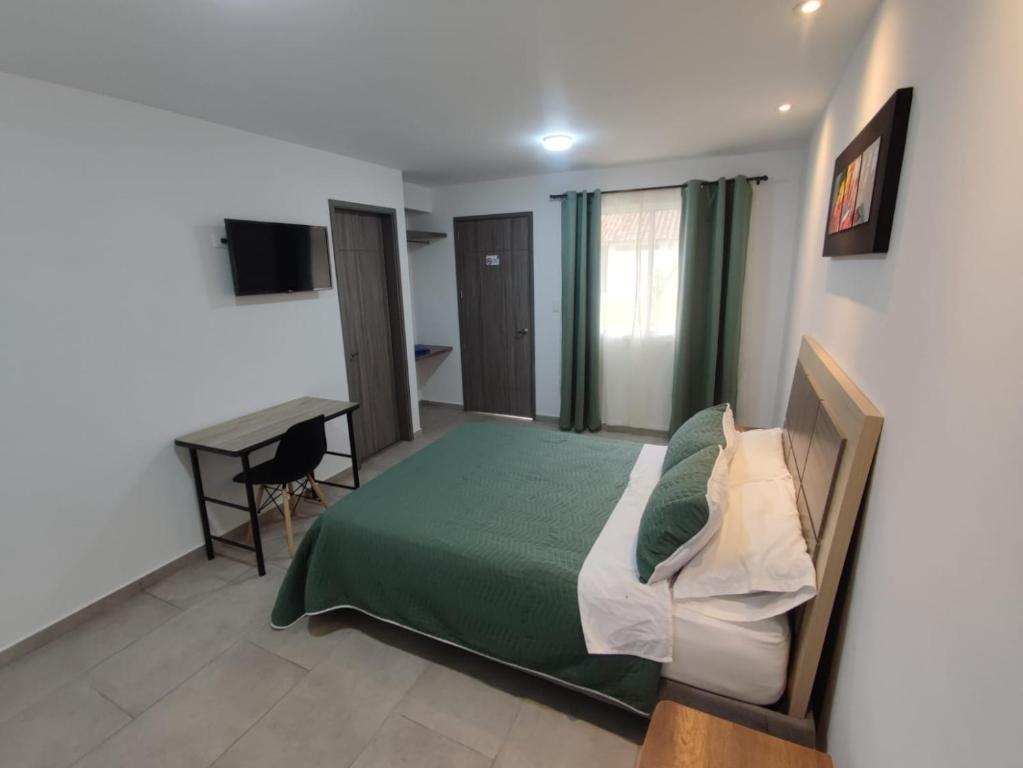 Postel nebo postele na pokoji v ubytování Hotel Villa Bosco