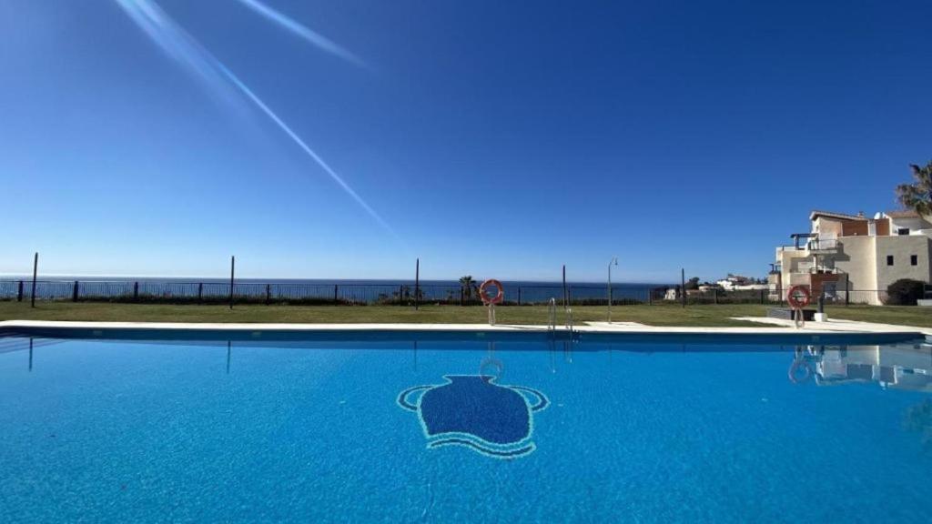 Bazén v ubytování Apartment with sea views Calaceite nebo v jeho okolí