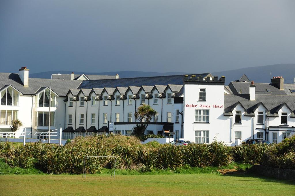 a large white building with a sign on it at Butler Arms Hotel in Waterville