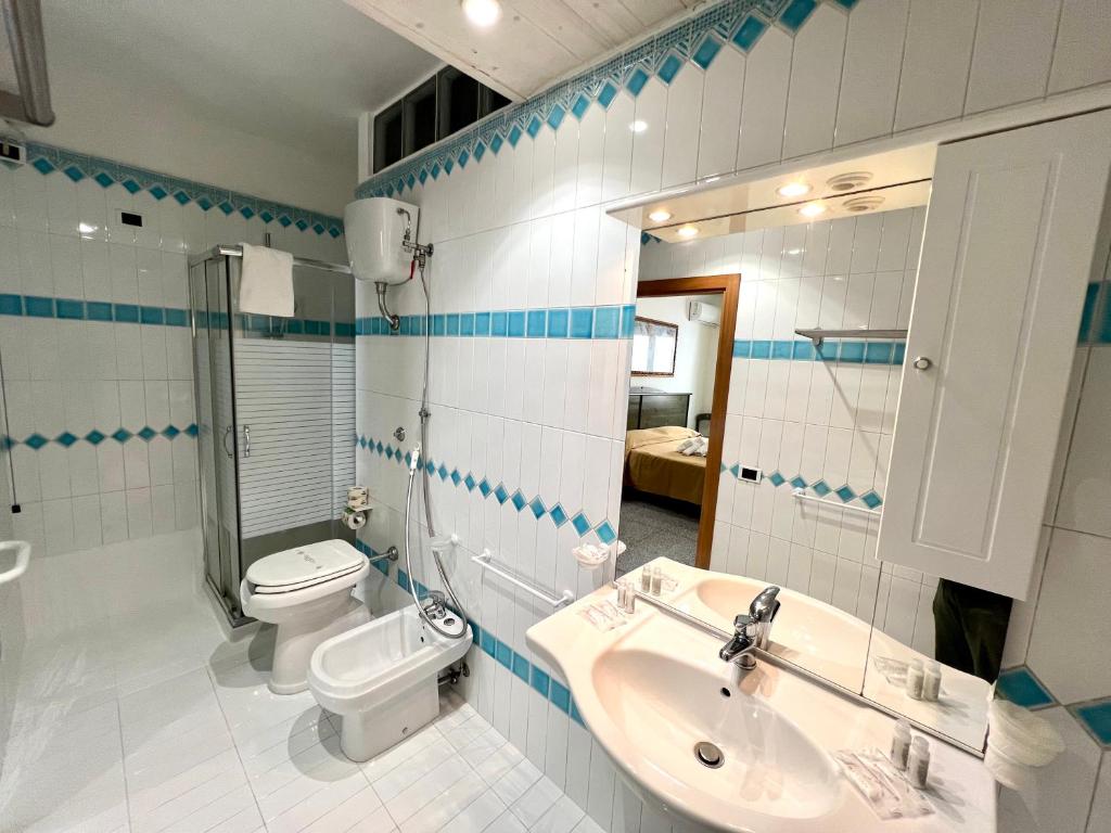 Koupelna v ubytování Hotel Minerva