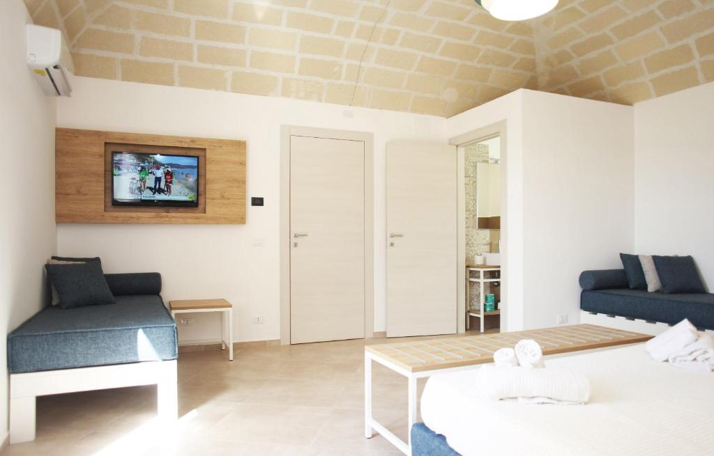 TV a/nebo společenská místnost v ubytování Gli Archi garden rooms
