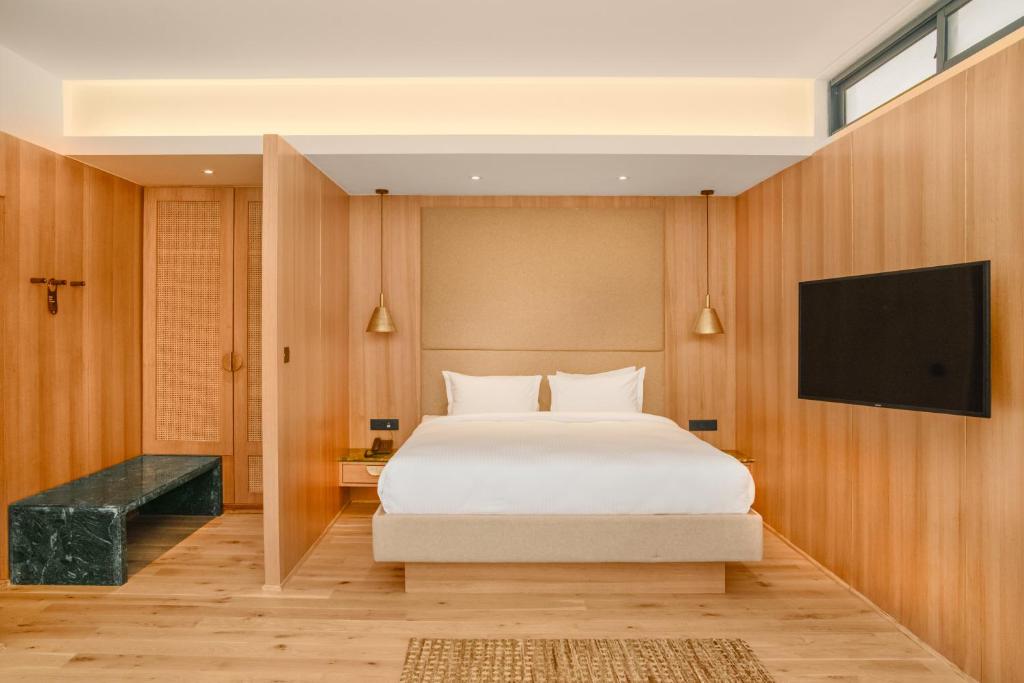 Postel nebo postele na pokoji v ubytování Nomad Hotel Lazimpat
