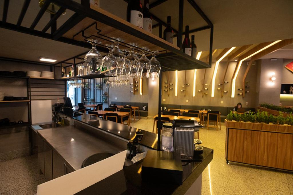 Um restaurante ou outro lugar para comer em eSuites Virgínia Luxemburgo