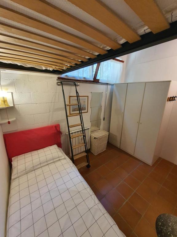 Łóżko lub łóżka w pokoju w obiekcie Poggiolindo B&B