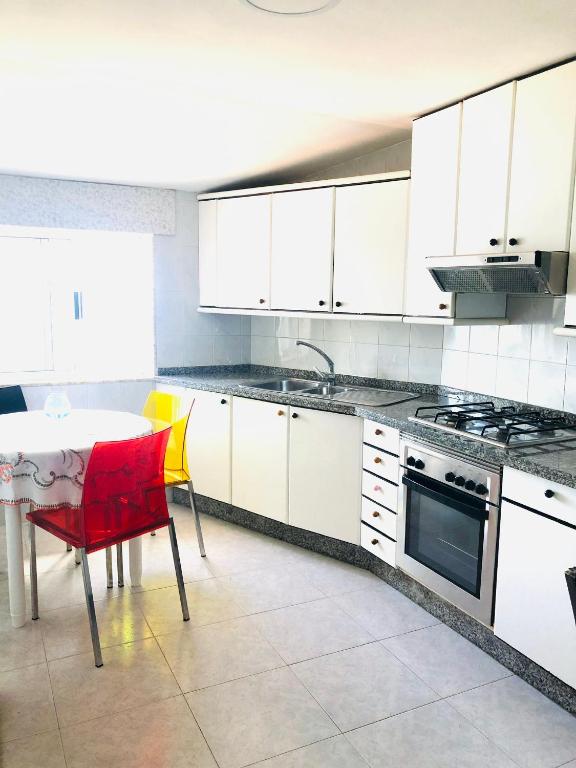 Kuchyňa alebo kuchynka v ubytovaní Maison Blanche