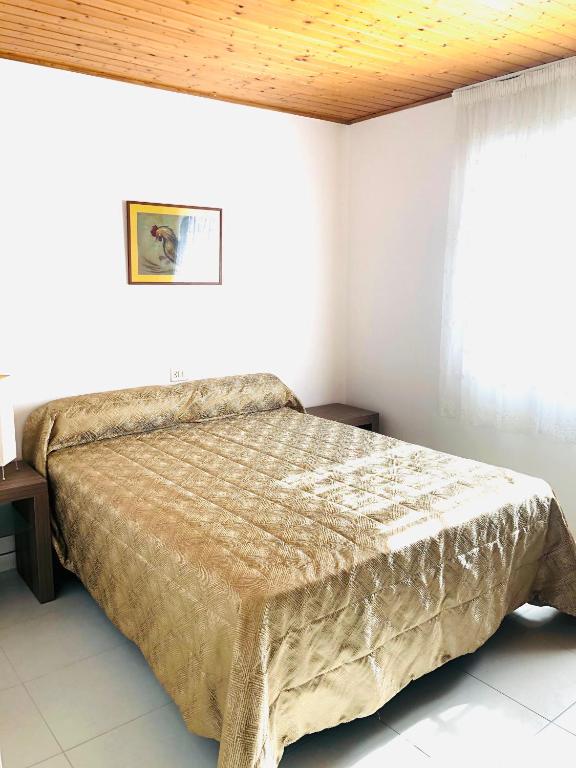 Posteľ alebo postele v izbe v ubytovaní Maison Blanche